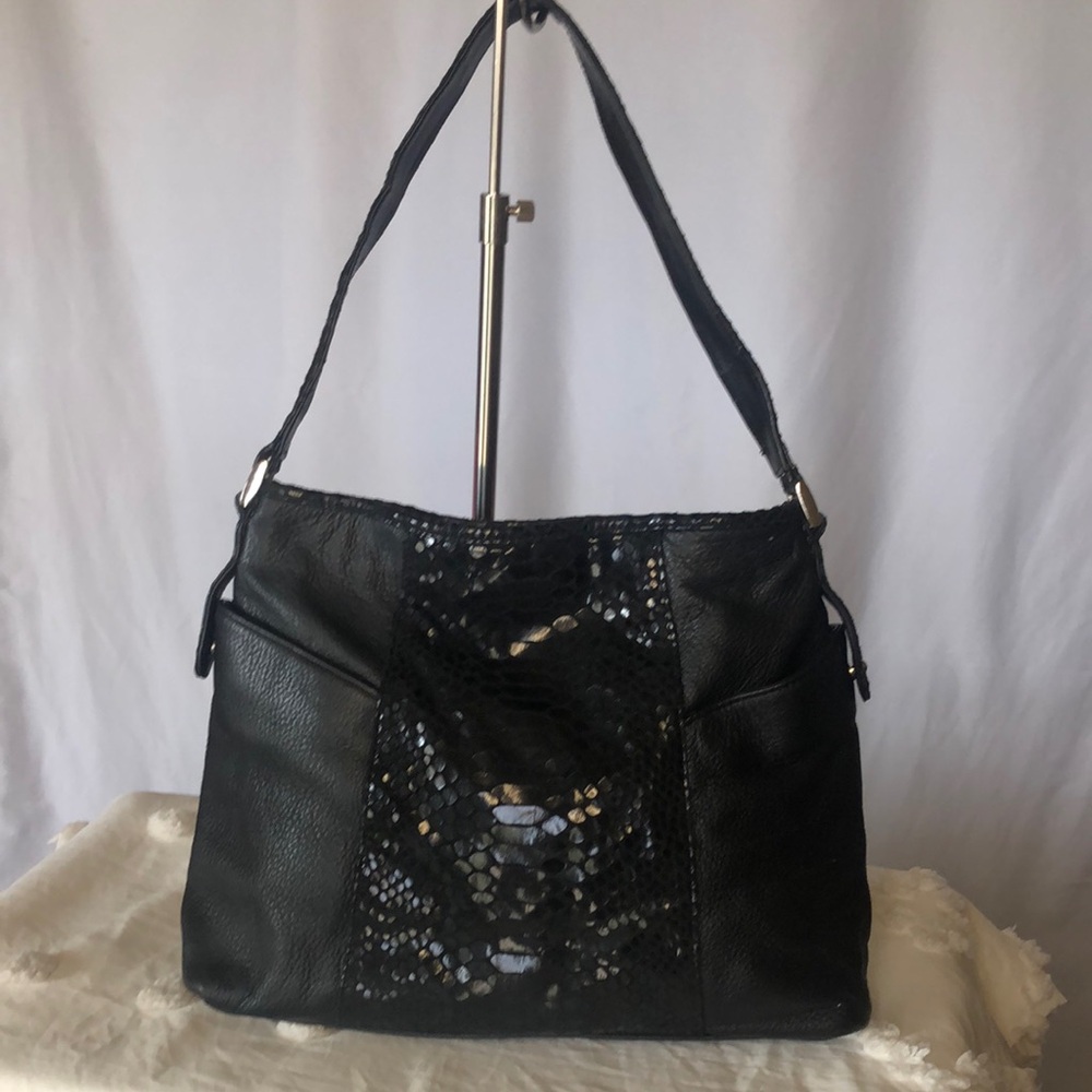 STONE & COMPANY black leather snakeskin print shoulder bag. Silver hardware.